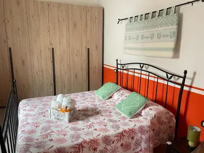 Letto o letti in una camera di Canne al vento