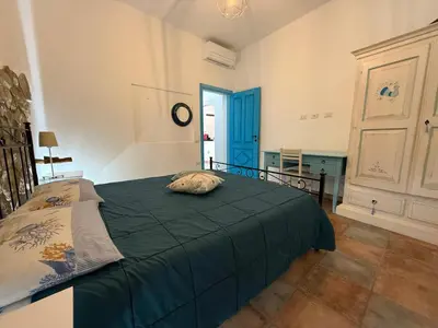 Letto o letti in una camera di Canne al vento