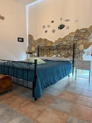 Letto o letti in una camera di Canne al vento