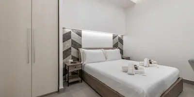 Letto o letti in una camera di Ichnusa Rooms
