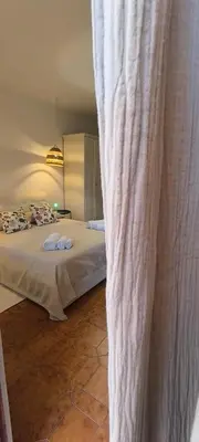 Letto o letti in una camera di Villa Rosa