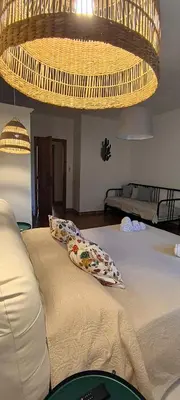 Letto o letti in una camera di Villa Rosa