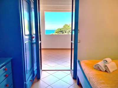 Letto o letti in una camera di Villetta Celeste - vista mare - 80metri dalla spiaggia