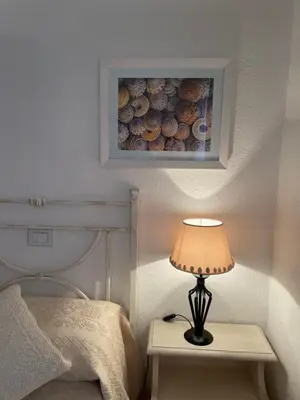 Letto o letti in una camera di Villa Amantea