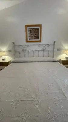 Letto o letti in una camera di Villa Amantea