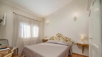 Letto o letti in una camera di Villa Gea 8, Emma Villas