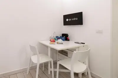 TV o dispositivi per l'intrattenimento presso Approdo Rooms - Eja Sardinia