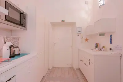 Cucina o angolo cottura di Approdo Rooms - Eja Sardinia