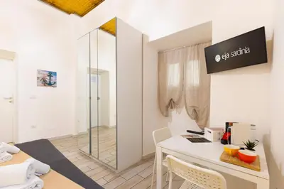 TV o dispositivi per l'intrattenimento presso Approdo Rooms - Eja Sardinia