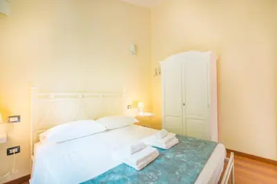 Letto o letti in una camera di Villa Luna . Chia Eden Rock . Wifi AC