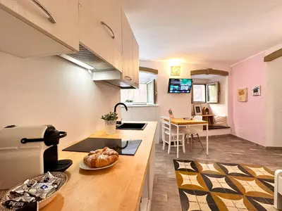 Cucina o angolo cottura di Alle Scalette Santa Teresa - City Center