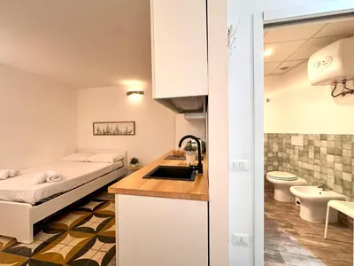 Cucina o angolo cottura di Alle Scalette Santa Teresa - City Center
