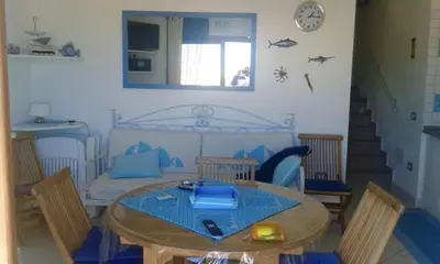 Area soggiorno di Costa Verde, Torre dei Corsari with a terrace overlooking the sea and close to the pristine dunes