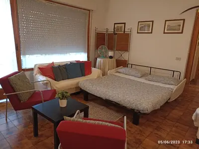 Area soggiorno di ERIKA House Is Molas