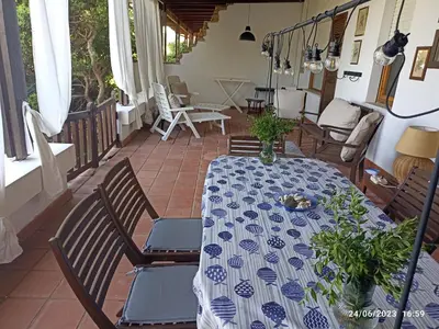 Area soggiorno di ERIKA House Is Molas