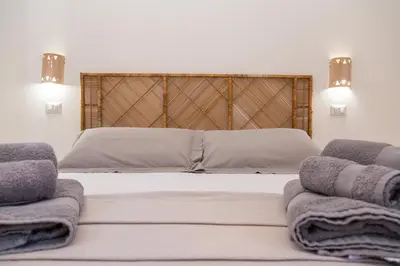 Letto o letti in una camera di Maestrale a pochi passi dal mare