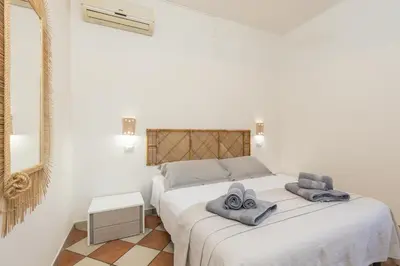 Letto o letti in una camera di Maestrale a pochi passi dal mare