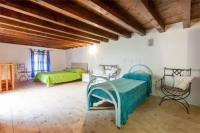 Letto o letti in una camera di House by the sea