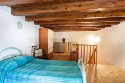 Letto o letti in una camera di House by the sea