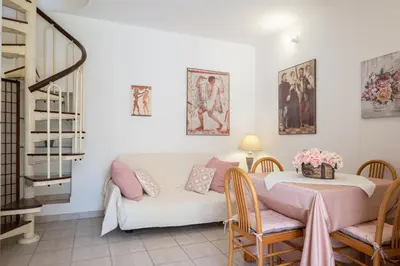 Area soggiorno di ⭑⭑⭑⭑⭑La perla Rosa nel centro storico a Carloforte