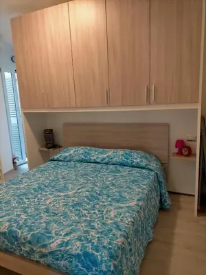 Letto o letti in una camera di Casa Giada