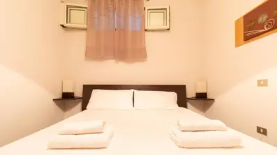Letto o letti in una camera di Casa Corbezzolo