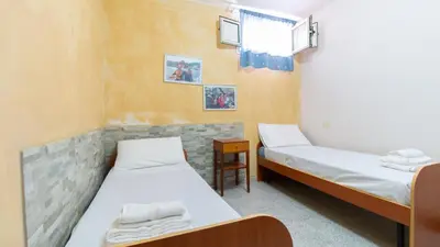 Letto o letti in una camera di Casa Corbezzolo