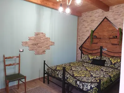 Letto o letti in una camera di Stanza Del Viggiatore