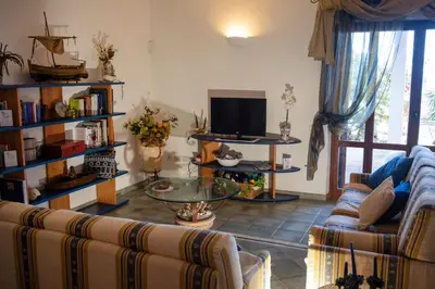 Area soggiorno di Villa By The Beach