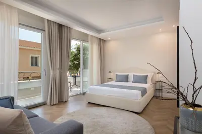 Letto o letti in una camera di Tèlos Rooms