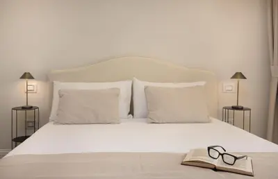 Letto o letti in una camera di Tèlos Rooms