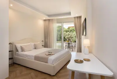 Letto o letti in una camera di Tèlos Rooms
