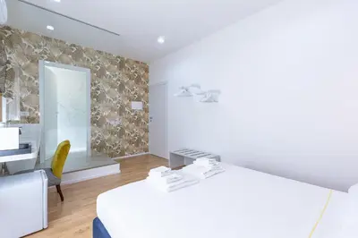 Letto o letti in una camera di ALMi