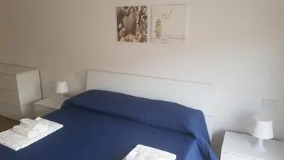 Letto o letti in una camera di Residenza Bottego Pineta