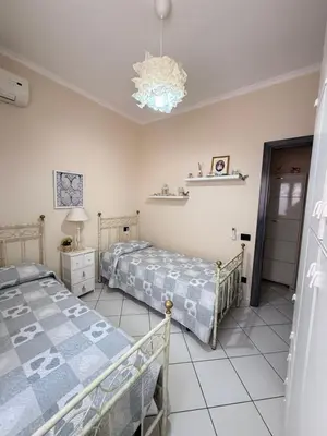 Letto o letti in una camera di Residenza butterfly IUN R6379
