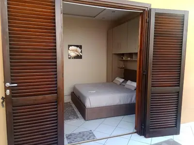 Letto o letti in una camera di Residenza butterfly IUN R6379