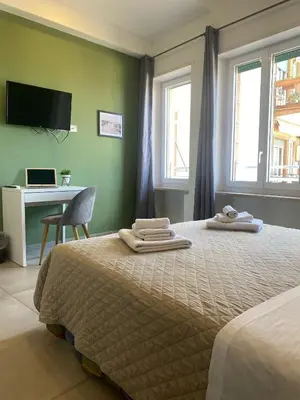 Letto o letti in una camera di ISTAI Cagliari City Center Rooms