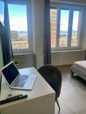 Letto o letti in una camera di ISTAI Cagliari City Center Rooms
