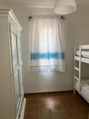 Letto o letti in una camera di Villa Elisa a cinque minuti dalla spiaggia