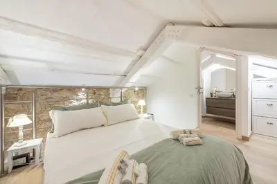 Letto o letti in una camera di Adriana's New Loft