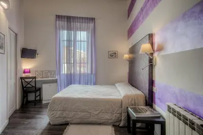 Letto o letti in una camera di Al Bastione di Cagliari