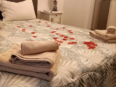 Letto o letti in una camera di Le stanze di elisa