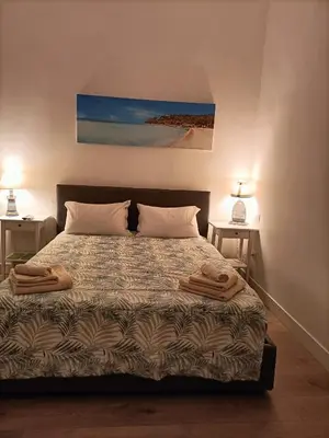 Letto o letti in una camera di Le stanze di elisa