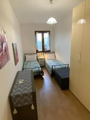 Letto o letti in una camera di Casa di Lu