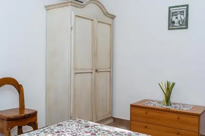 Letto o letti in una camera di Villetta il Carrubo vista mare
