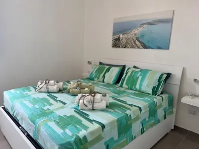 Letto o letti in una camera di Appartamento il Sinis