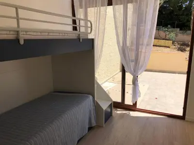 Letto o letti in una camera di Casa Daniela - Kala & Moru