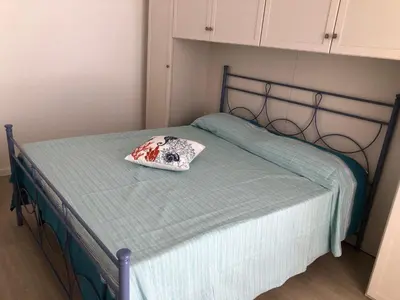 Letto o letti in una camera di Casa Daniela - Kala & Moru
