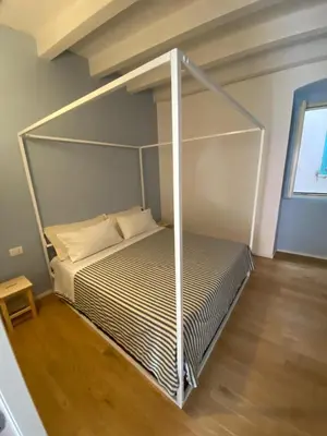 Letto o letti in una camera di Le Vele Carloforte