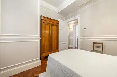 Letto o letti in una camera di Regina Elena - Antica Dimora, Bastione S. Remy